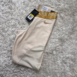 Nike pro leggings  with gold band